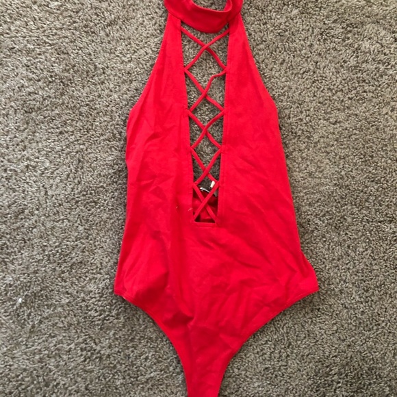 red backless bodysuit